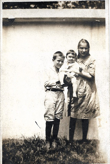 Bernard and Helen holding cousin Tina